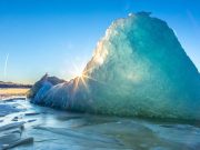 Photo of iceberg in the sun.