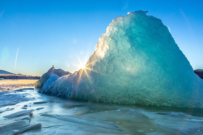 Photo of iceberg in the sun.