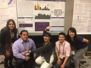 Ezequiel Lopez Barragan, Rochelle-Jan Reyes, Samantha Kristin Dung, Andrea López, and Ricky Thu present their work at 2018's Population, Evolutionary and Quantitative Genetics Conference. Photo credit: Mayra Banuelos.